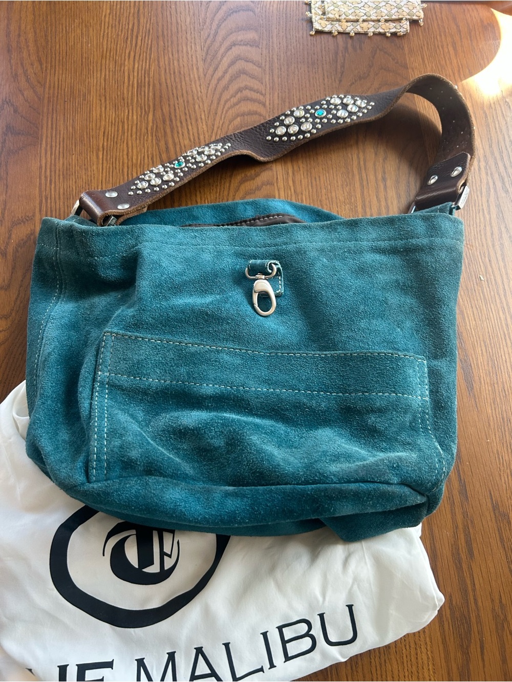 Tylie Malibu Teal Suede Crossbody Bag with Embellished Strap